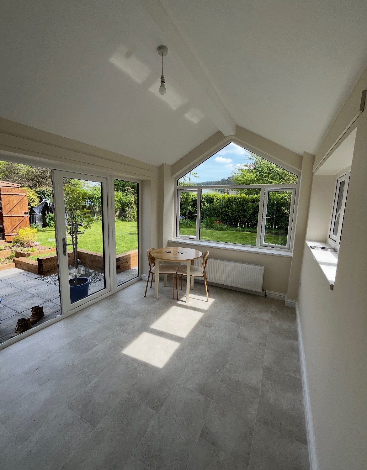 Garden room interior with bifold doors to the patio